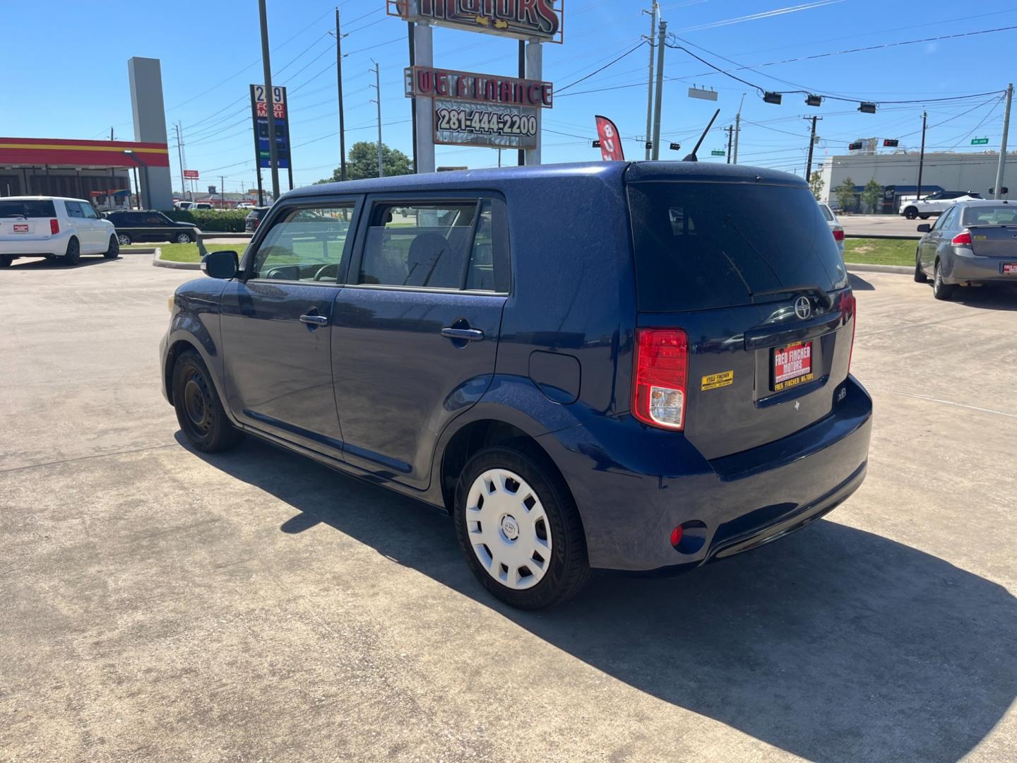 2014 blue /black Scion xB (JTLZE4FE1EJ) , Automatic transmission, located at 14700 Tomball Parkway 249, Houston, TX, 77086, (281) 444-2200, 29.928619, -95.504074 - Photo#4